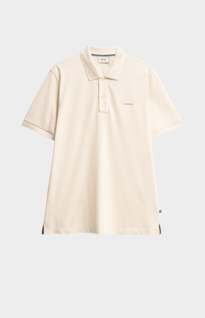 Beige polo shirt on a light gray background