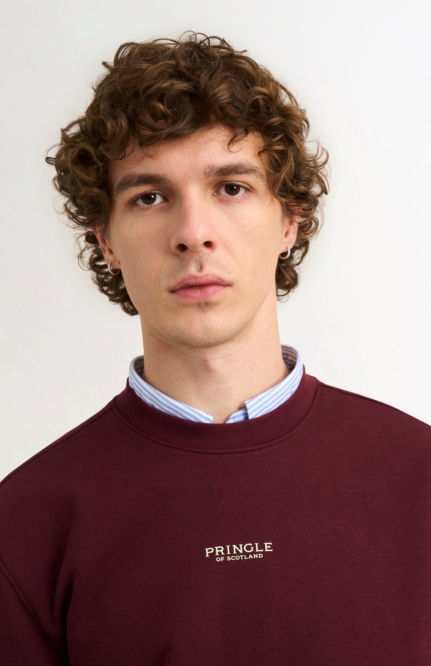 Pringle of Scotland Men's Crew Neck Sweatshirt In Burgundy showing chest logo
