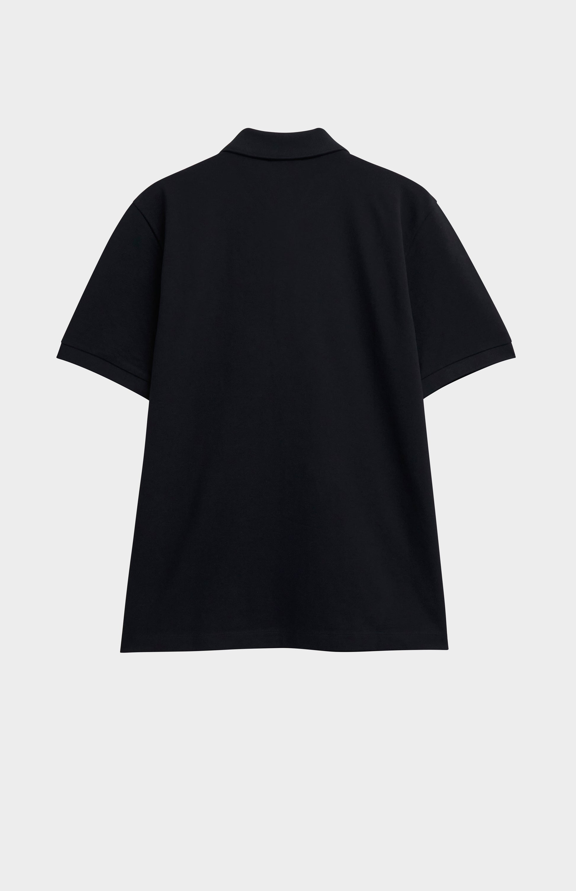 Black polo shirt on a light gray background