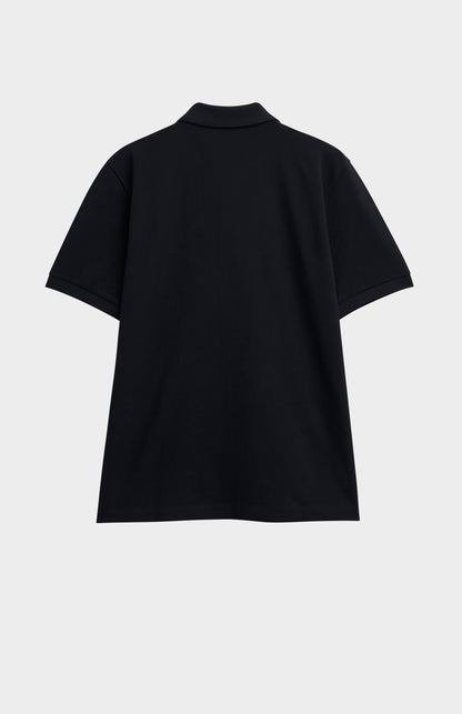 Black polo shirt on a light gray background