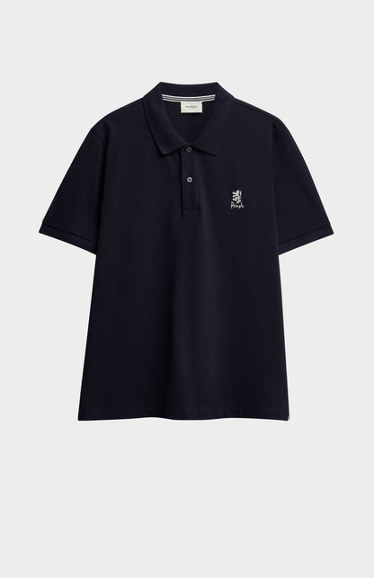 Navy blue polo shirt with a small logo on a light gray background