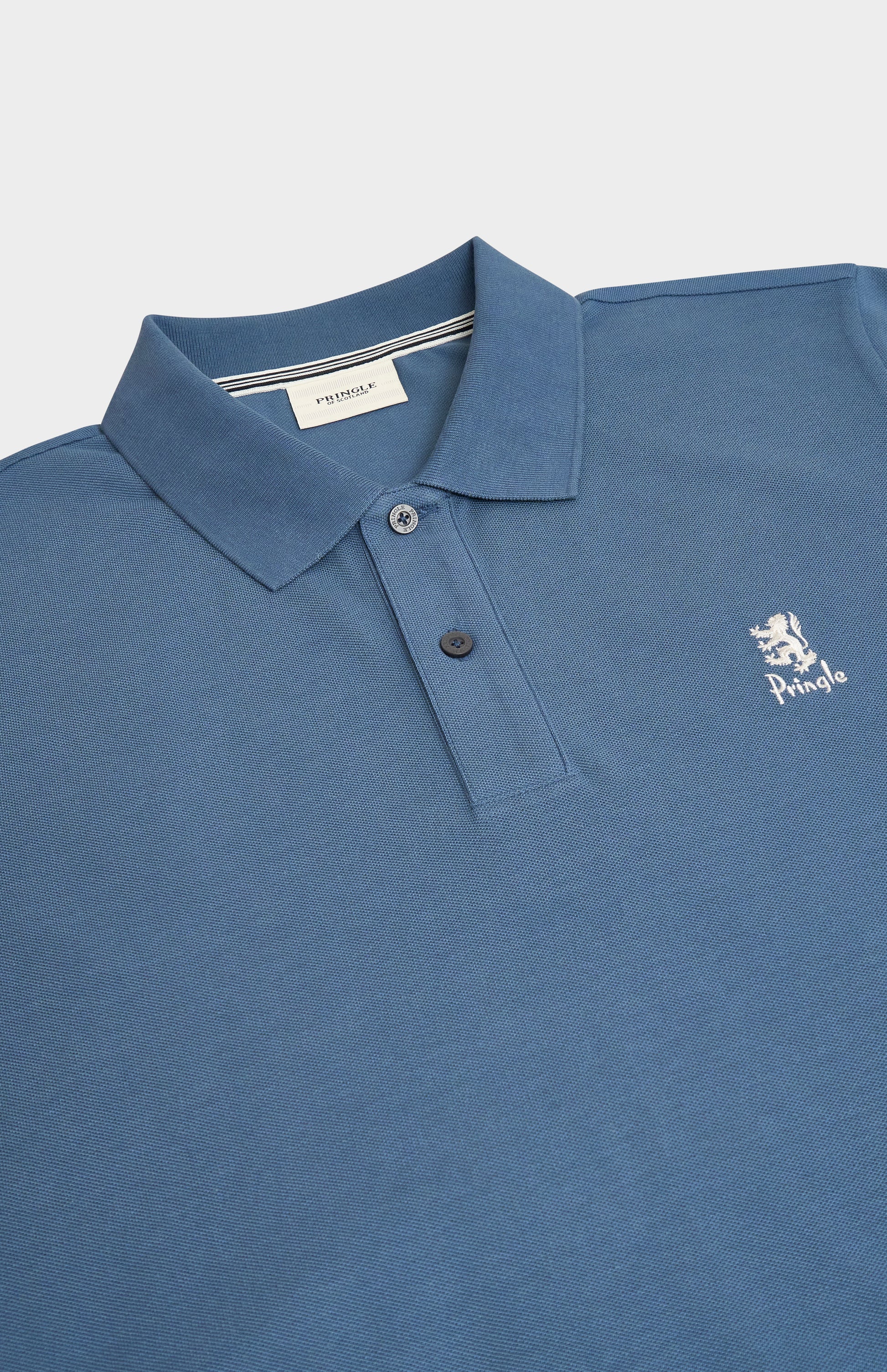 Blue polo shirt with a brand logo on a light gray background