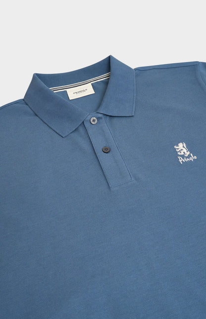 Blue polo shirt with a brand logo on a light gray background