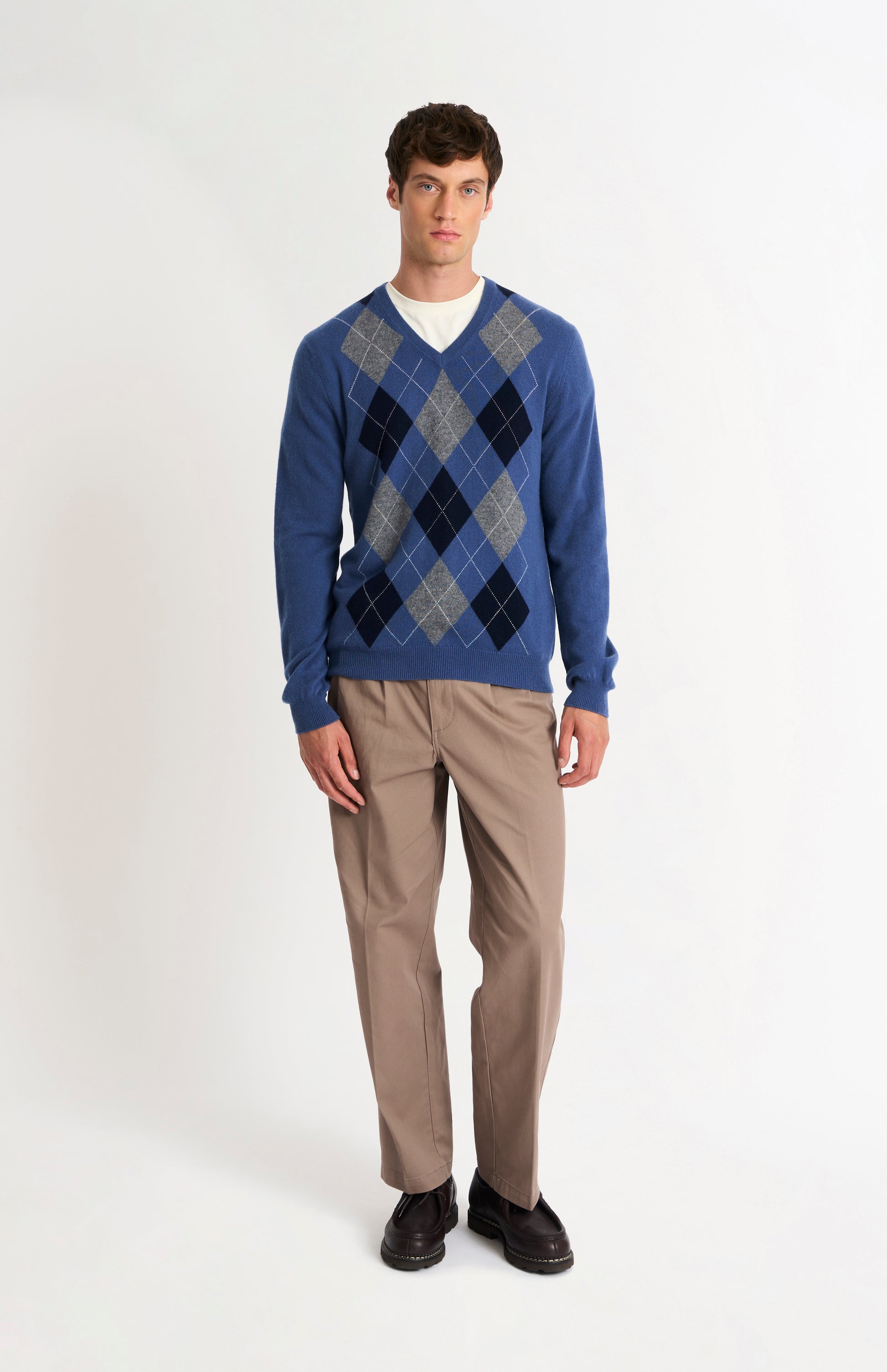 Pringle Men’s Argyle Cashmere V-Neck Jumper In Blue, Navy & Grey on model full length