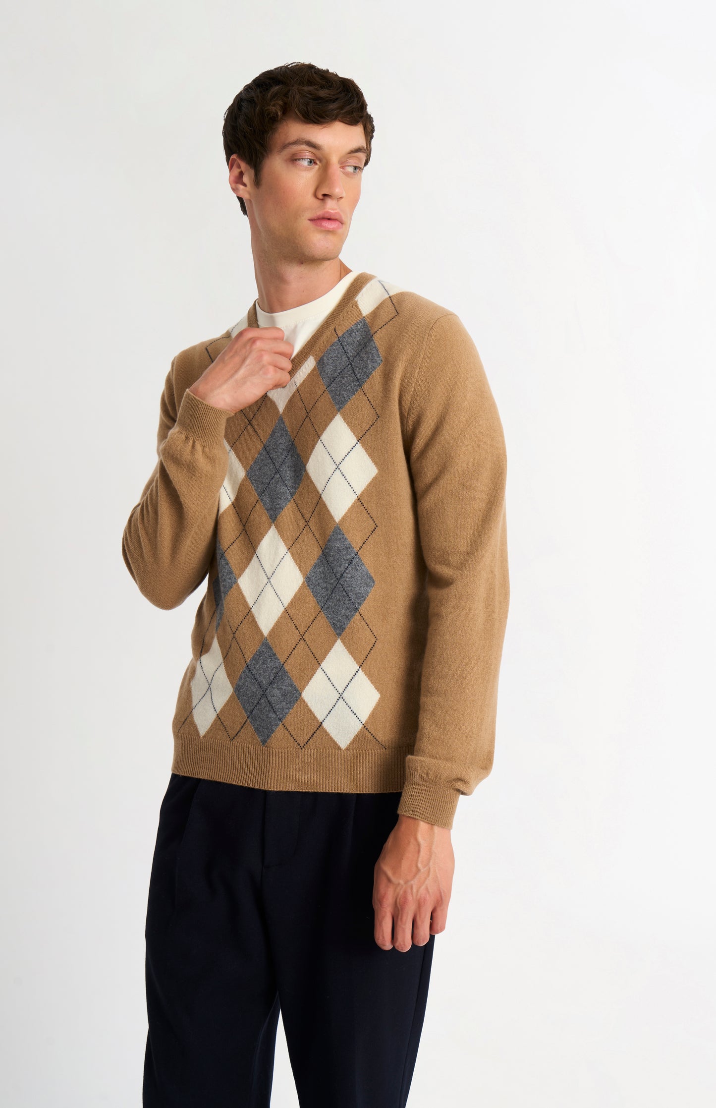Pringle Men’s Argyle Cashmere V-Neck Jumper In Camel, Ecru & Grey on model side view