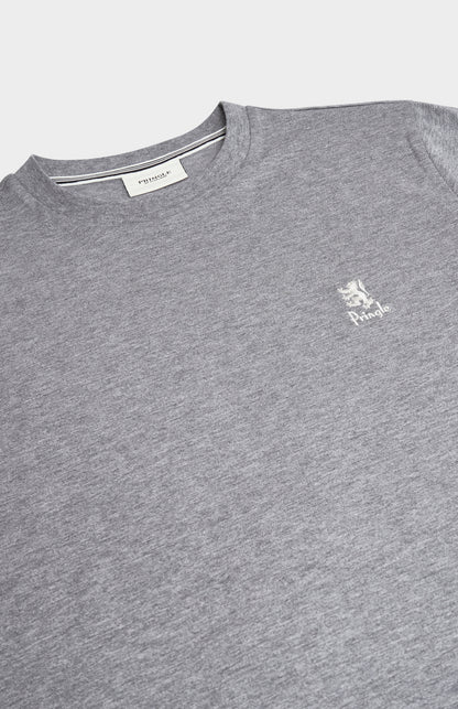 Close up of a grey t-shirt with a white brand logo on a white background