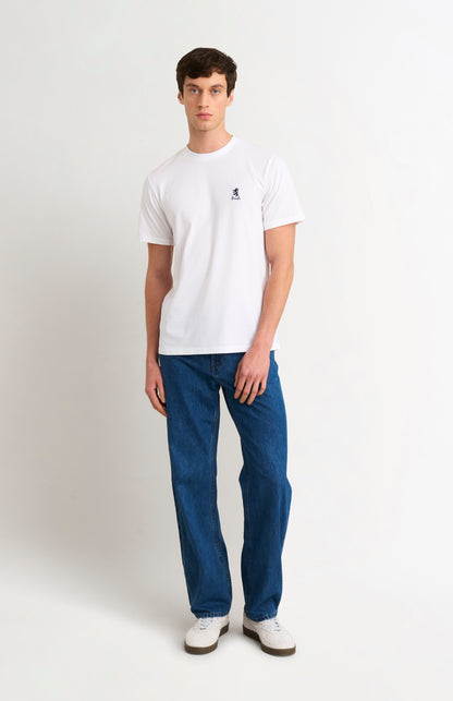 Man wearing white t-shirt and blue jeans on a white background