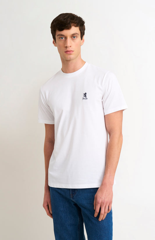 Man wearing white t-shirt and blue jeans on a white background