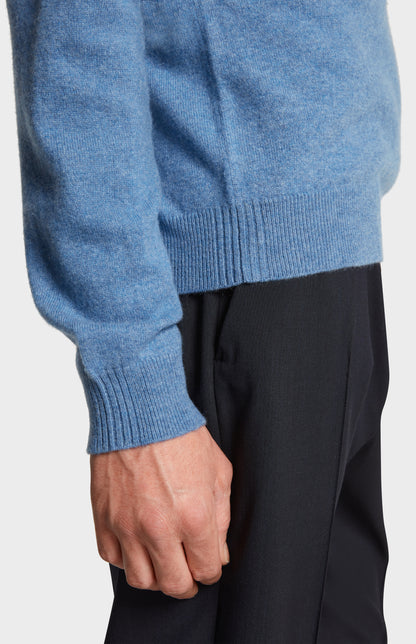 Close Up Image of Sleeve Detail of Pringle of Scotland Men's V Neck Cashmere Jumper in Blue