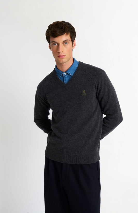 Pringle of Scotland Men’s Lambswool V Neck Jumper In Charcoa on model