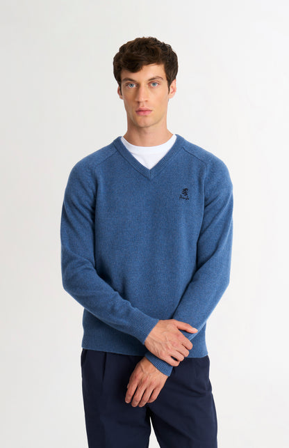 Pringle of Scotland Men’s Lambswool V Neck Jumper In Bering Sea Blue on model