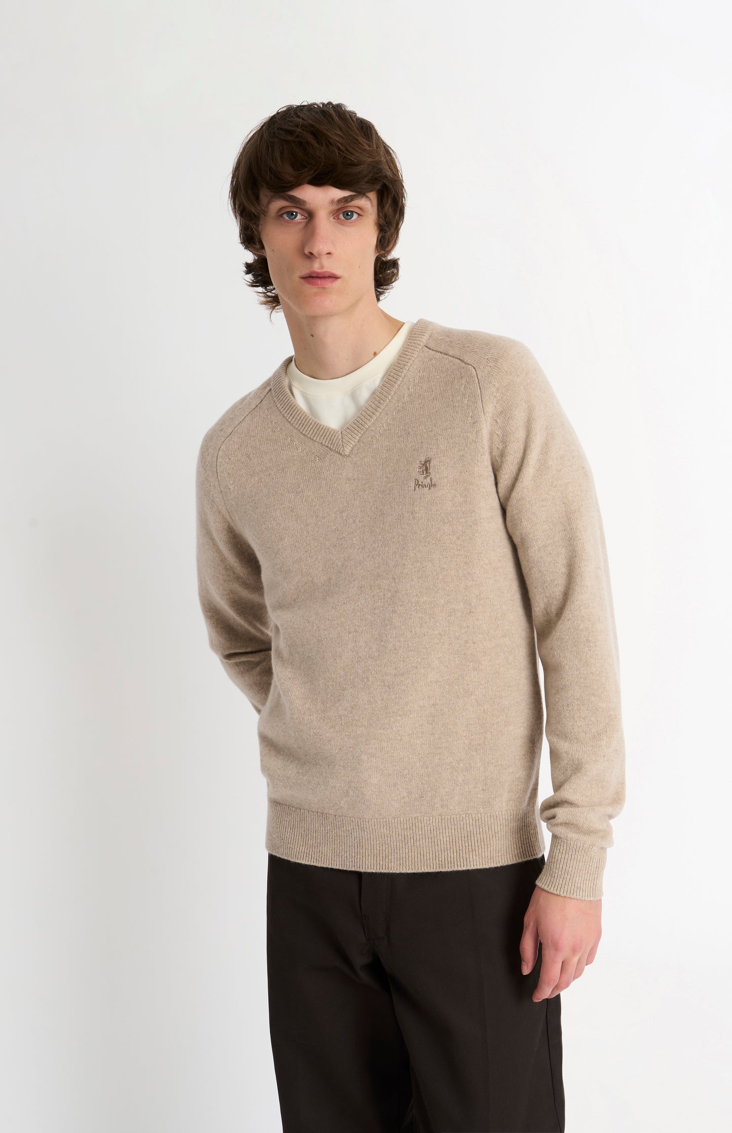 Pringle of Scotland Men’s Lambswool V Neck Jumper In Oatmeal on model