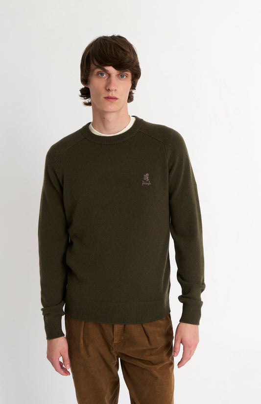 Pringle of Scotland Men’s Lambswool Crew Neck Jumper In Dark Olive on a model