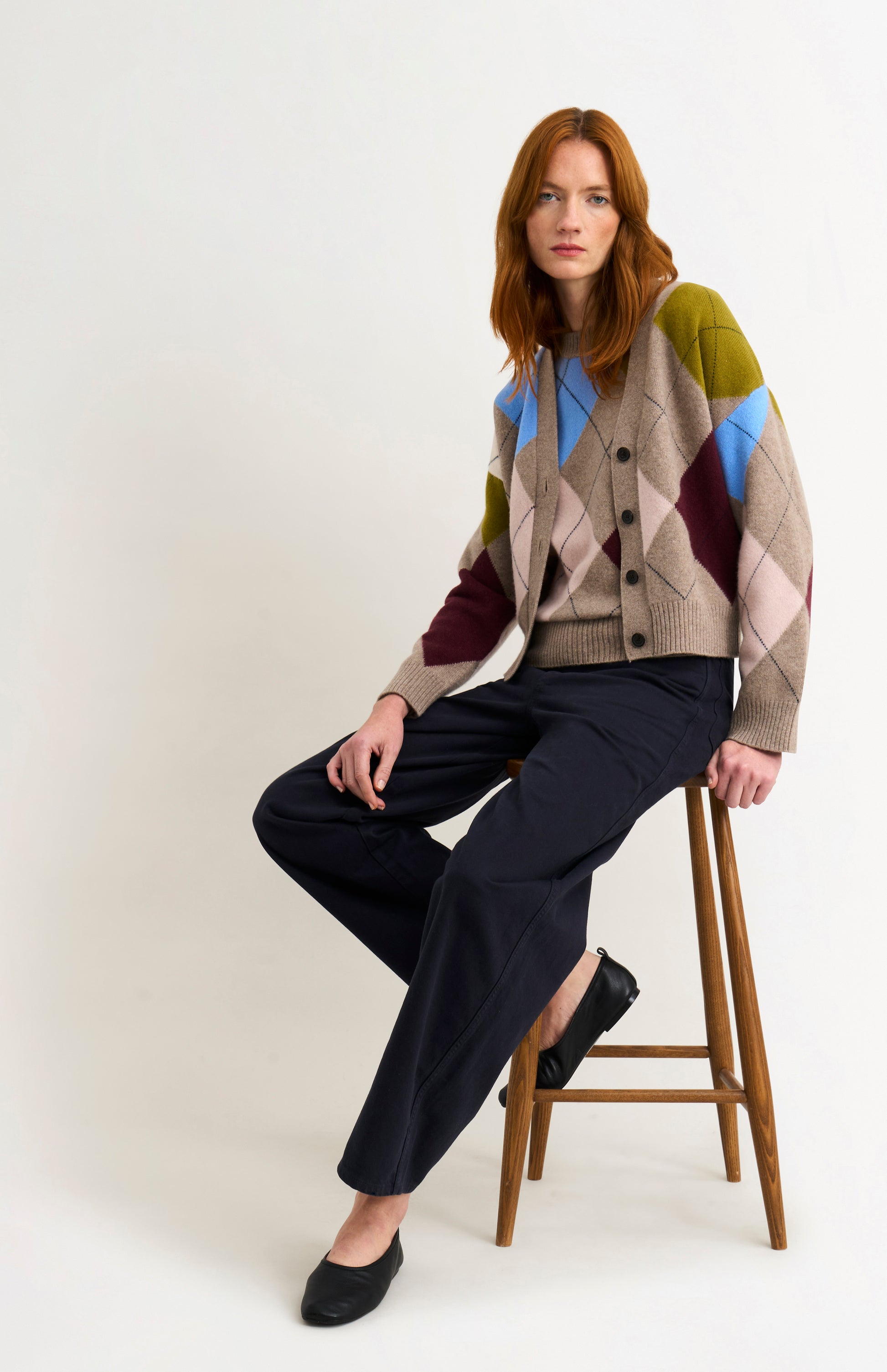 Pringle Women's Lambswool Argyle Cardigan in Mushroom / Multi on sitting model