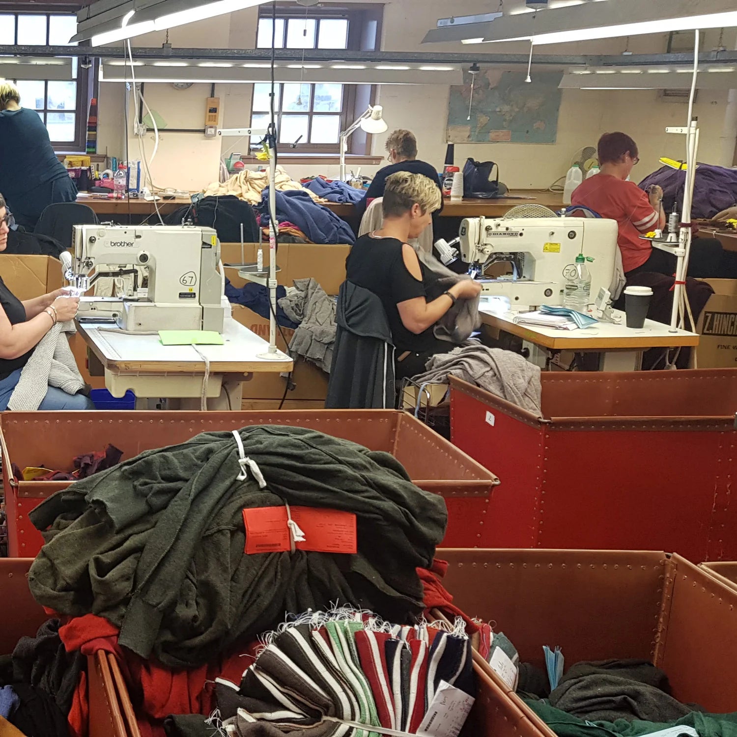 Pringle of Scotland workers sewing arms in bodies of jumpers